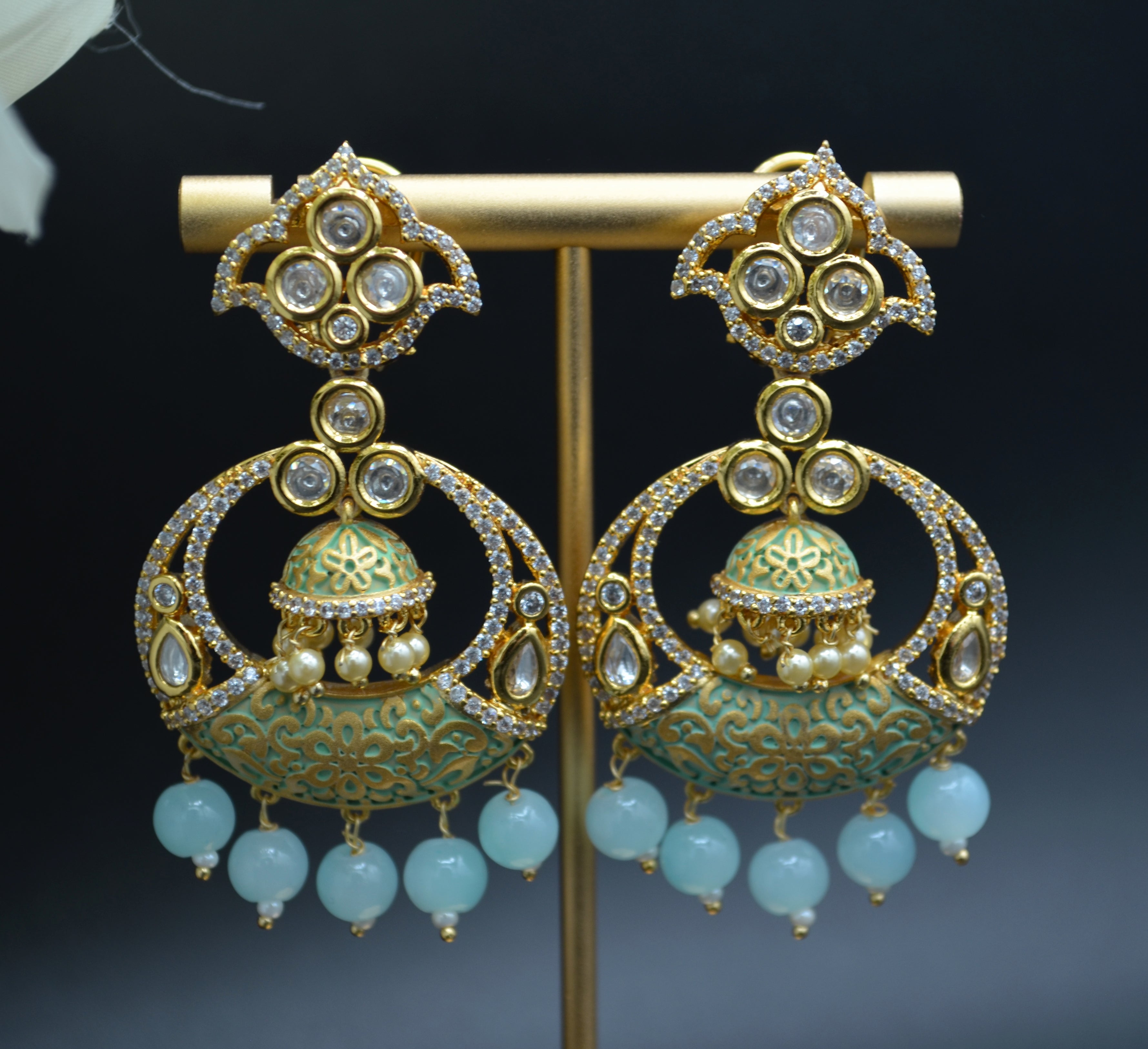 Meenakri Tyaani Ad Chandbali Earrings. Earrings